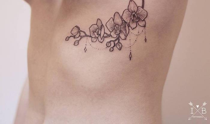 Tetovanie orchideí pod prsiami tetovanie kvety pod prsia
