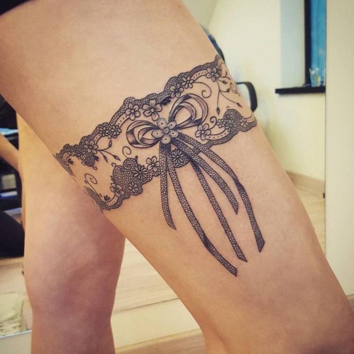 Podväzkové tetovanie stehna tetovanie uzol noha žena
