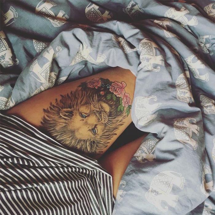 tetovanie leva na stehne pre ženy