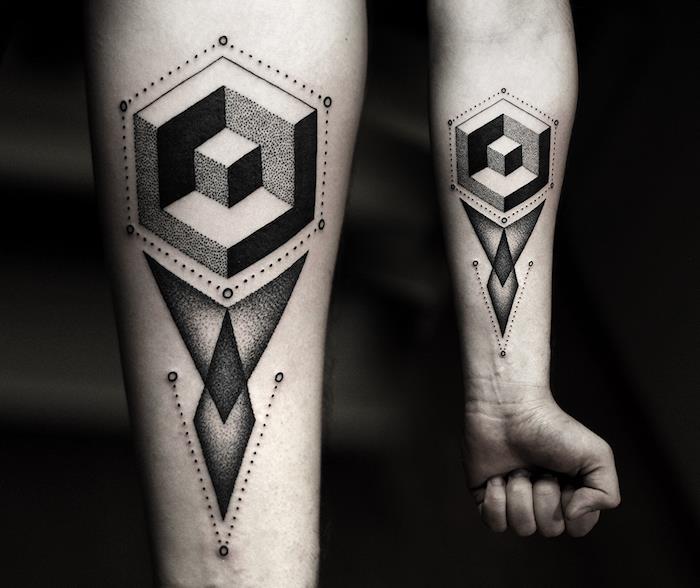 Avambraccio di un uomo con un tattoo geometrico e puntini