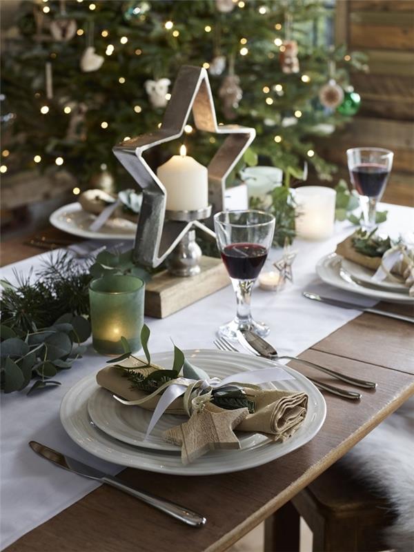 trä stjärna gröna grenar julbord dekoration lövverk ljus grön glas stjärna rustik dekor julgran