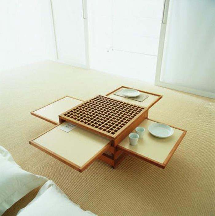 ett-vackert-trä-bord-i-plats-besparande-möbler-vardagsrum-med-en-rotting-matta