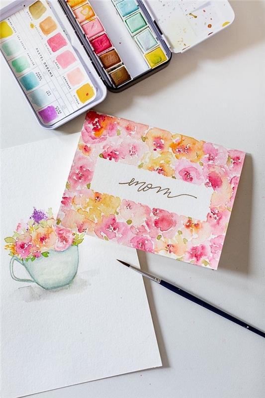 paleta pendures a akvarelová kresba kvetov v šálke kávy