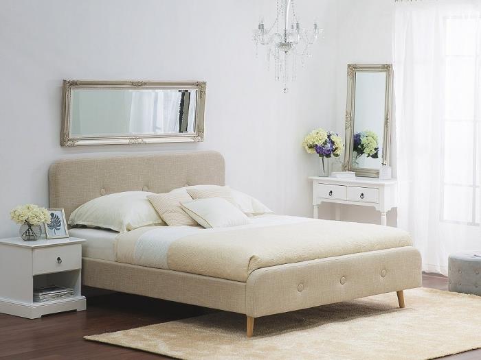vitt designer sovrum med stor knäppt huvud säng och beige rektangulär matta, vintage design horisontell spegel modell