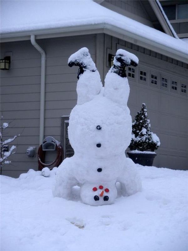 real-snowman-see-model-of-snowman-mrkva-nos