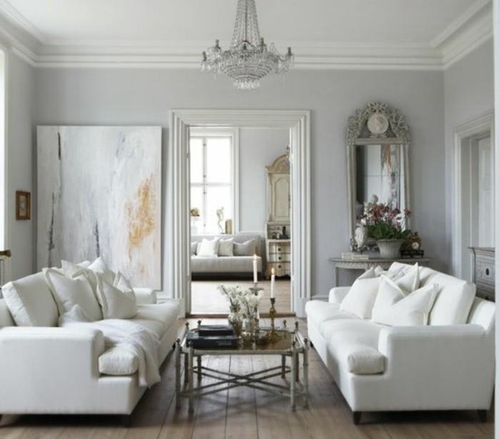 vita soffor, soffbord i metall, abstrakt konst, grå vardagsrumsmöbler, trägolv